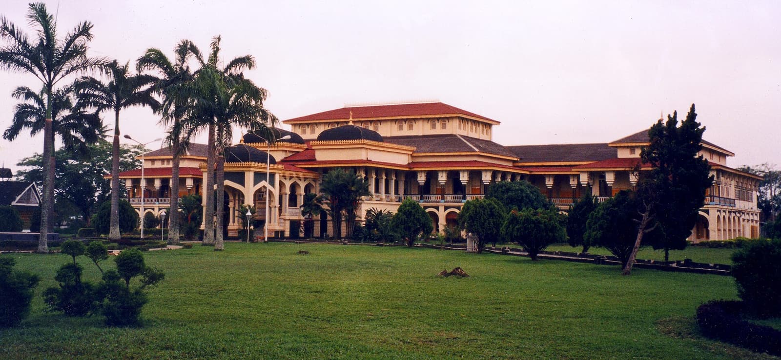 The yellow façade of Maimun Palace in Medan
