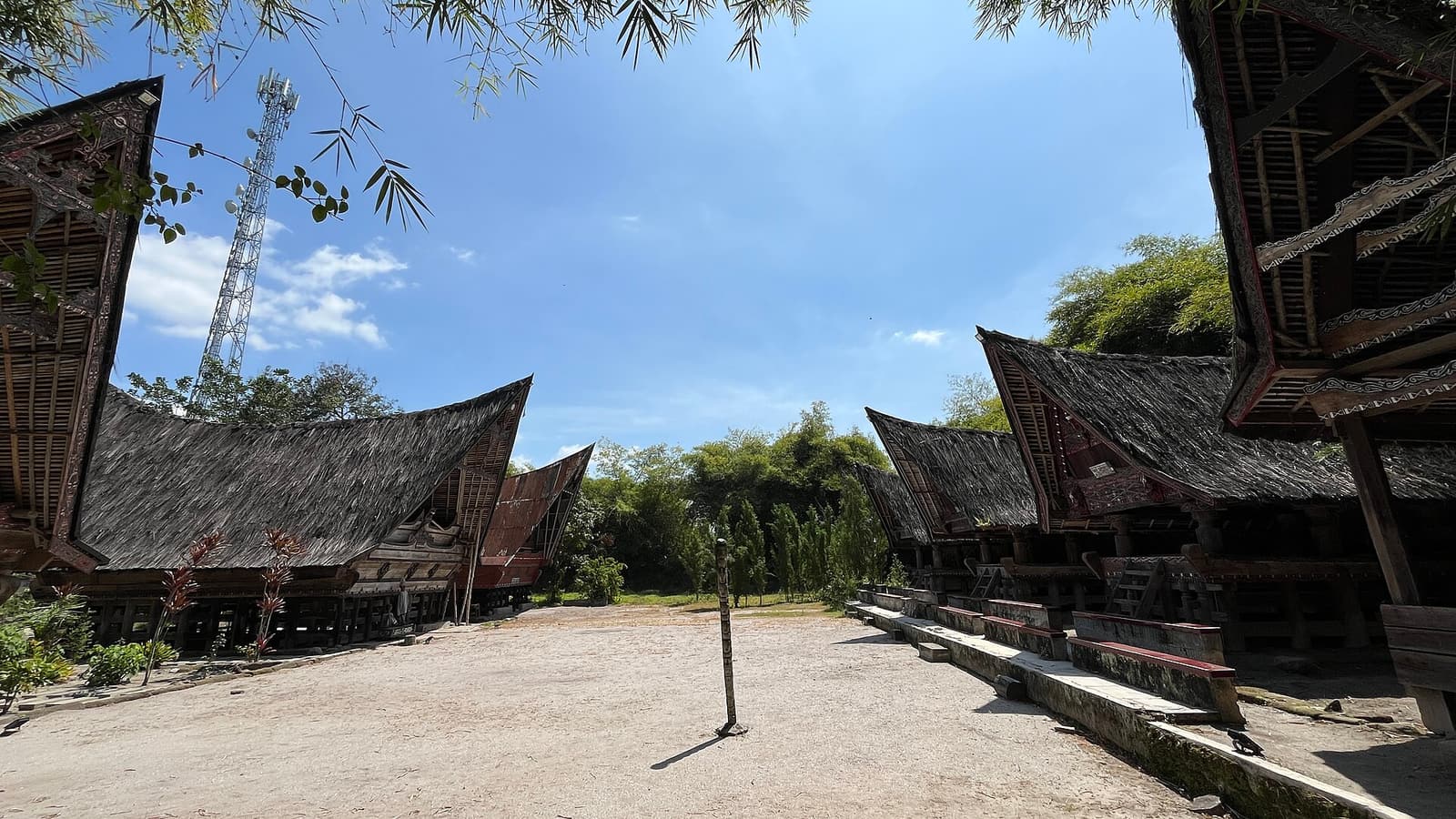 Traditional Batak houses with saddle-shaped roofs at the Huta Bolon Museum in Simanindo