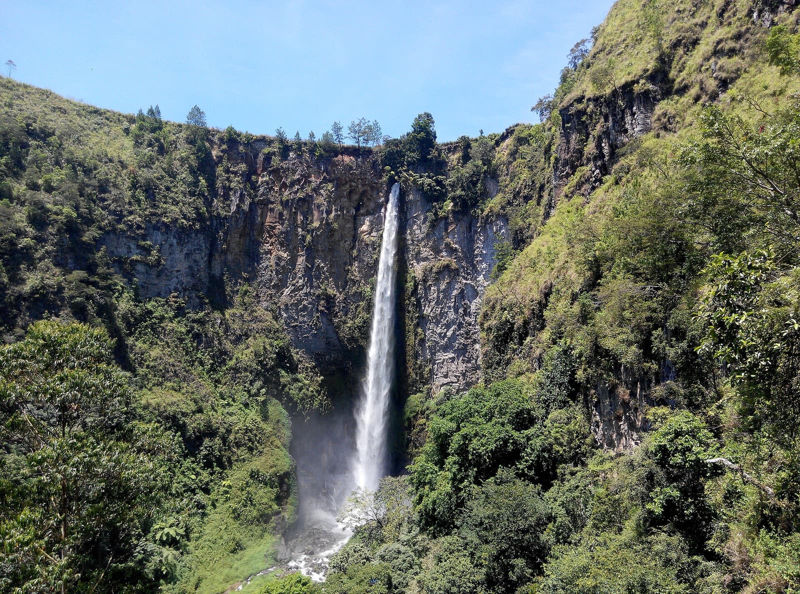 Sipiso-piso waterfall dropping from the caldera rim towards Lake Toba