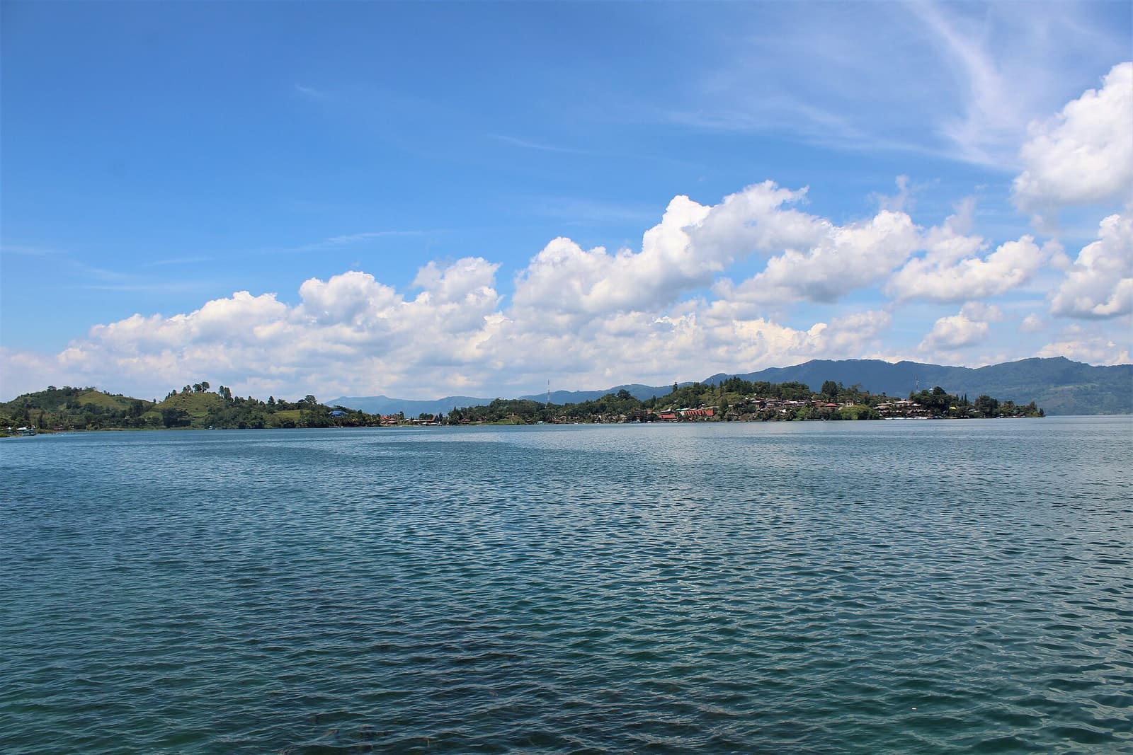 The Tuk Tuk peninsula on Samosir Island seen from the lake