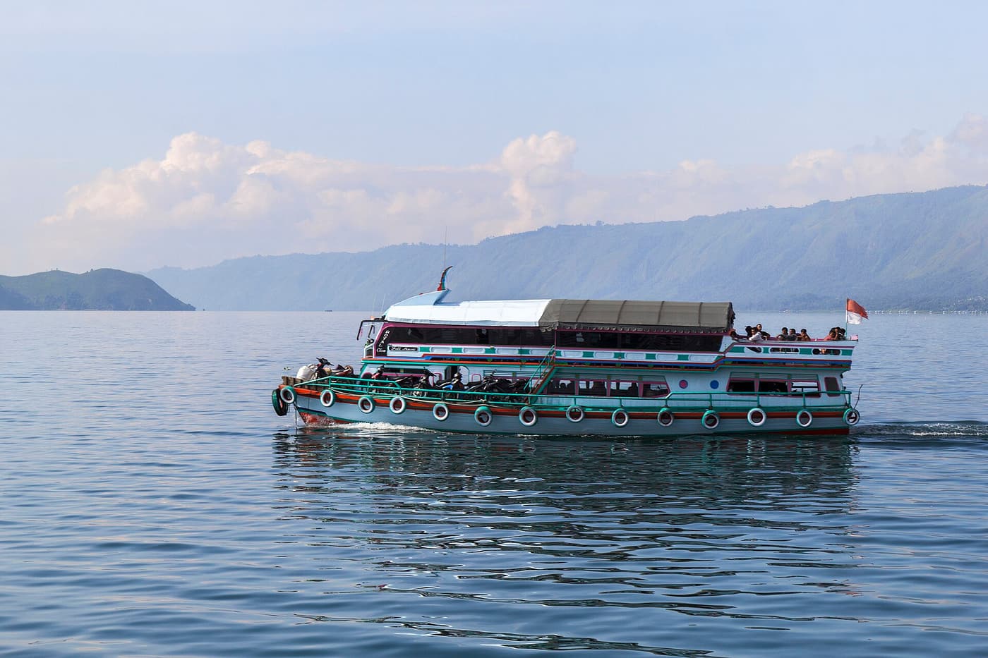 A passenger boat crossing Lake Toba near Parapat